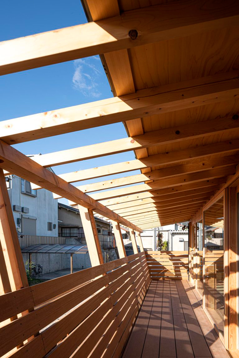 masaru takahashi clads family house 'G' in charred wood exterior in japan - 1
