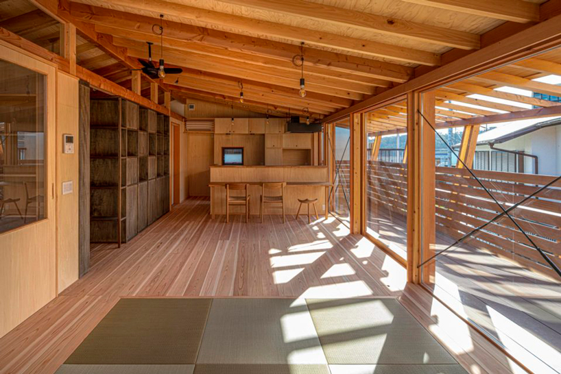 masaru takahashi clads family house 'G' in charred wood exterior in japan - 3