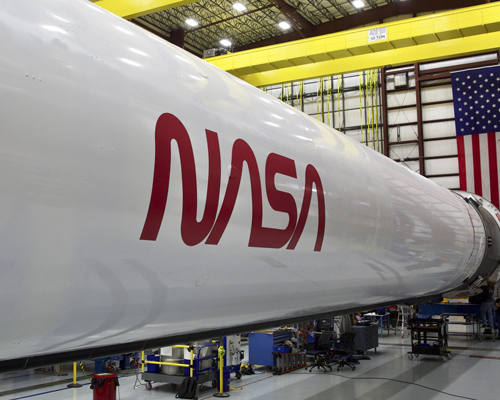 NASA brings back iconic 'worm' logo for spaceX falcon 9 rocket
