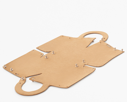 nendo designs 'flatpack' handbag made from a single piece of leather