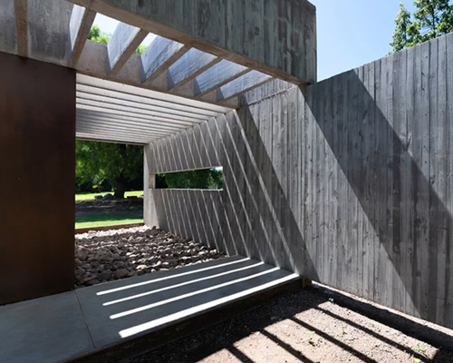 santiago viale plays with shadows and exposed concrete in villa allende, argentina