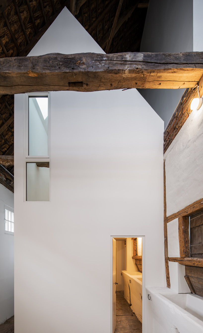 sigurd larsen sets dortmannhof house inside 200-year-old barn in western germany