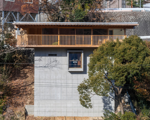 tomoaki uno architects places concrete + wood residence on steep slope in japan