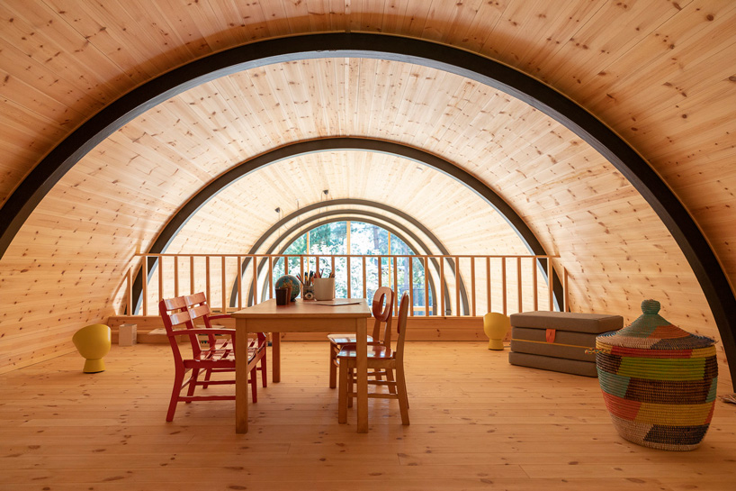 valbæk brørup architects tops wooden house in denmark with vaulted steel roof - 6