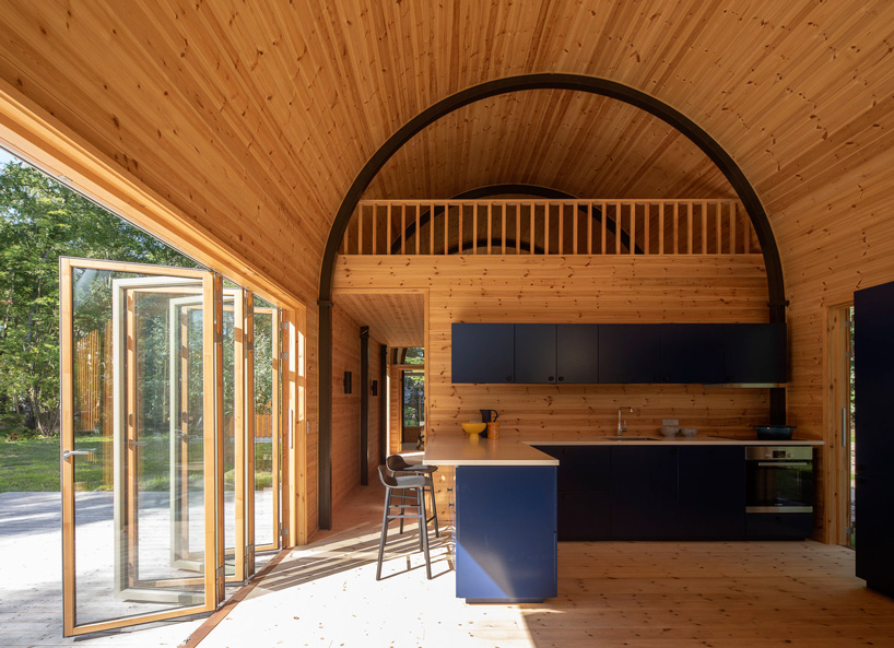 valbæk brørup architects tops wooden house in denmark with vaulted steel roof - 4