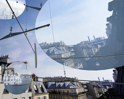 vincent leroy filters reality with 'floating lens' installation on parisian rooftops