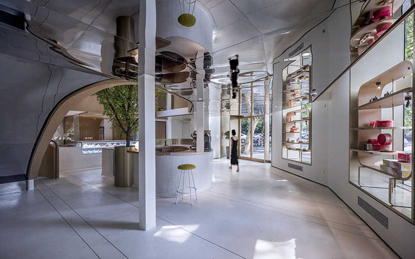 WJ design sets phoenix tree inside anshuka pastry shop in hangzhou, china