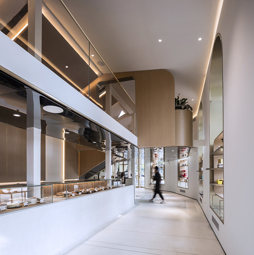 WJ design sets phoenix tree inside anshuka pastry shop in hangzhou, china