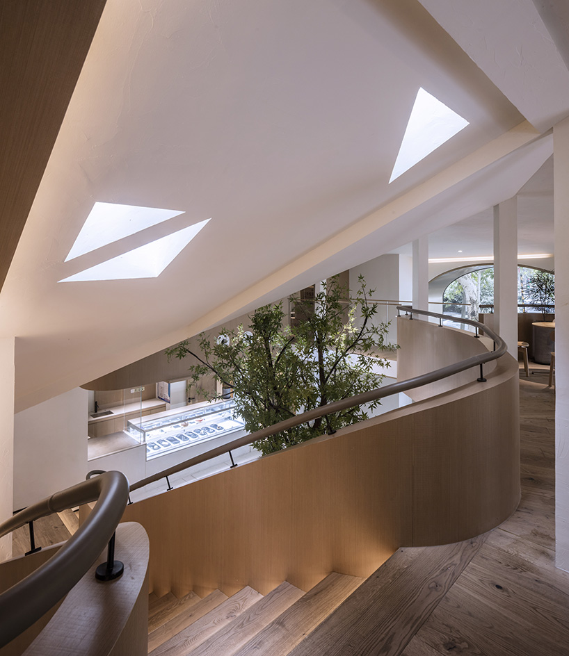 WJ design sets phoenix tree inside anshuka pastry shop in hangzhou, china - 2