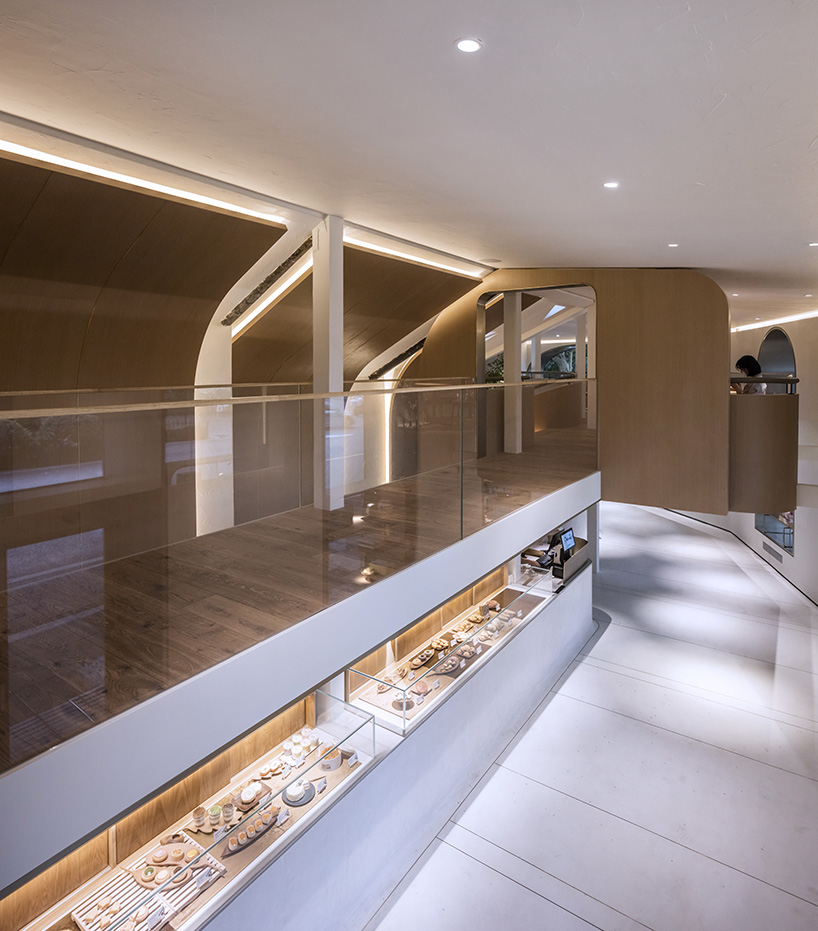 WJ design sets phoenix tree inside anshuka pastry shop in hangzhou, china - 4