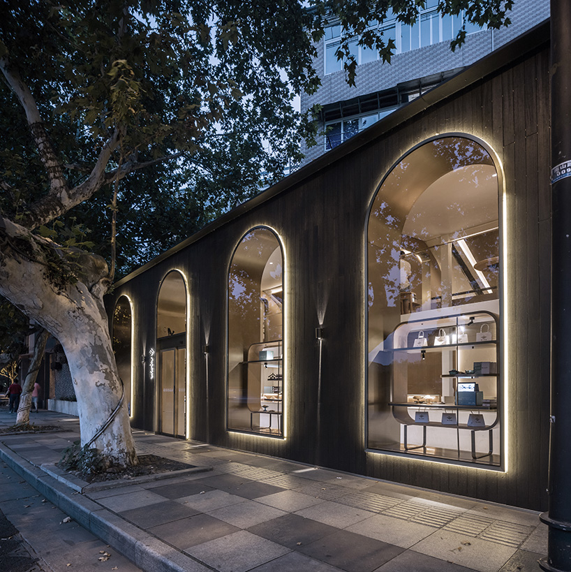 WJ design sets phoenix tree inside anshuka pastry shop in hangzhou, china - 5