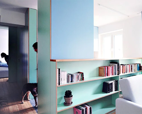 atelier starzak strebicki completes 50s apartment renovation in poland with colorful cabinets