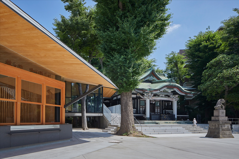 asai architects tops office building of tokyo's kameari katori shrine with folded-plate roof