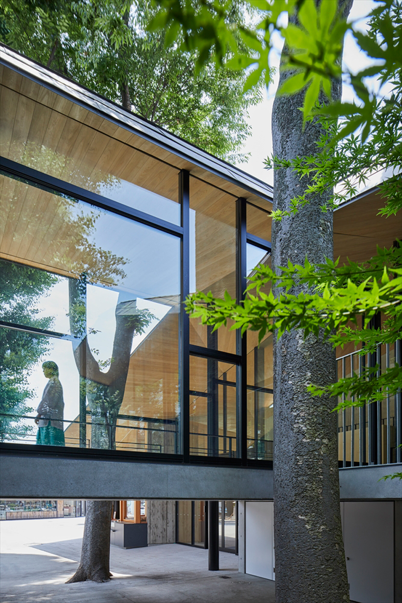 asai architects tops office building of tokyo's kameari katori shrine with folded-plate roof