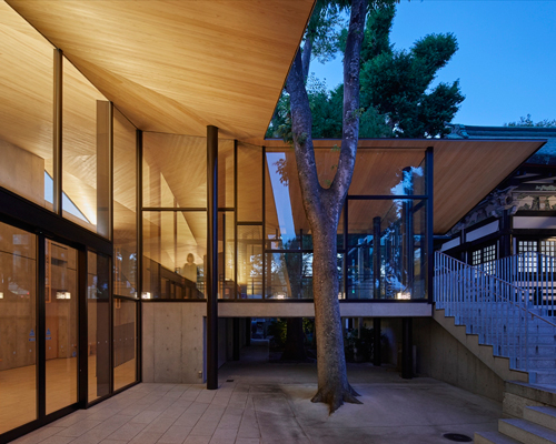 asai architects tops office building of tokyo's kameari katori shrine with folded-plate roof