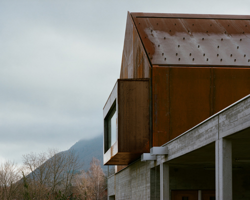 corten steel school in lugrin, france by ateliers o-s architectes overlooks lake geneva