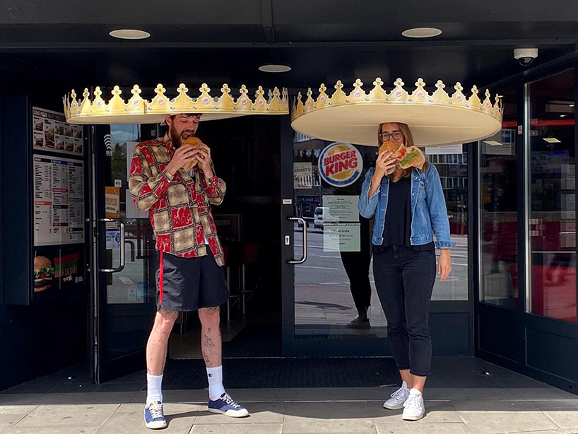 burger king is handing out giant crowns to ensure social distancing in germany