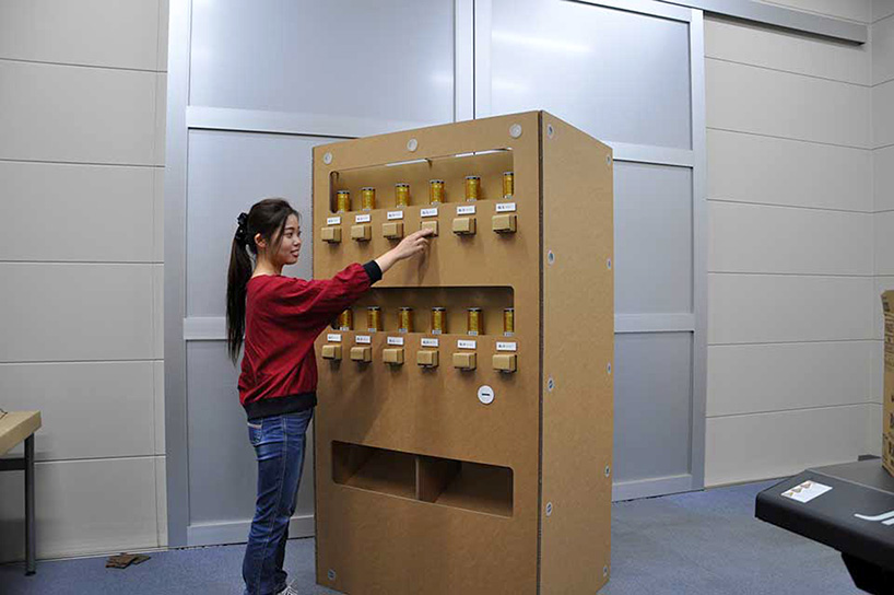 cardboard vending machine designboom