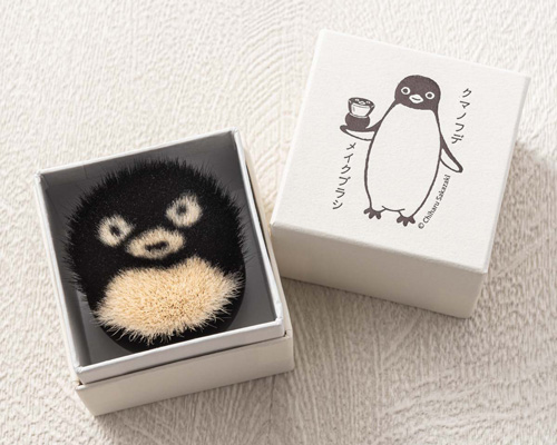 japanese illustrator chiharu sakazaki's penguin is transformed into handcrafted face brush