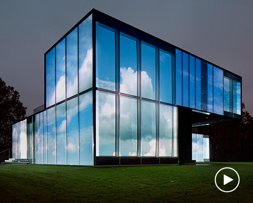 doug aitken's 'lighthouse' is an architecture-wrapping installation of changing landscapes filmed throughout the seasons