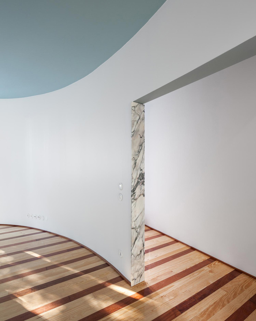 stripes and curved surfaces make fala atelier's house in fontaínhas, porto