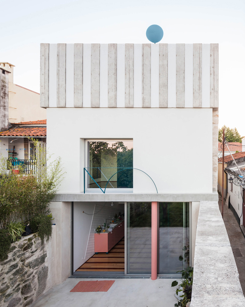 stripes and curved surfaces make fala atelier's house in fontaínhas, porto