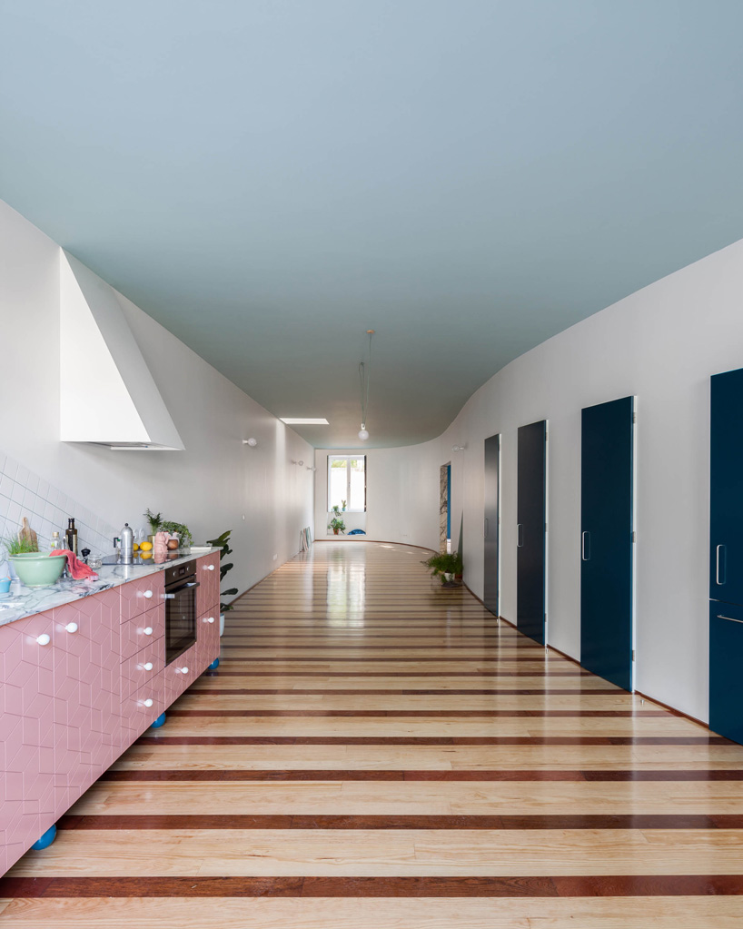 stripes and curved surfaces make fala atelier's house in fontaínhas, porto