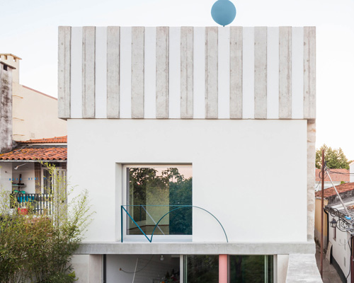 stripes and curved surfaces make fala atelier's house in fontaínhas, porto