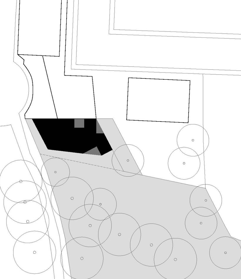 arnau estudi d'arquitectura embeds the 'forest stone' house into a sloped site in spain designboom