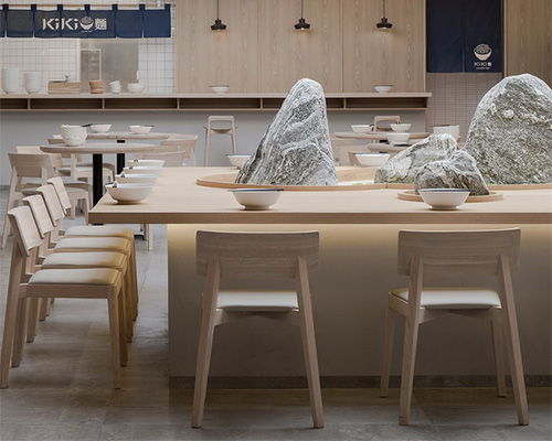 golucci adds rock-like formations within 'kiki' noodle house in shanghai