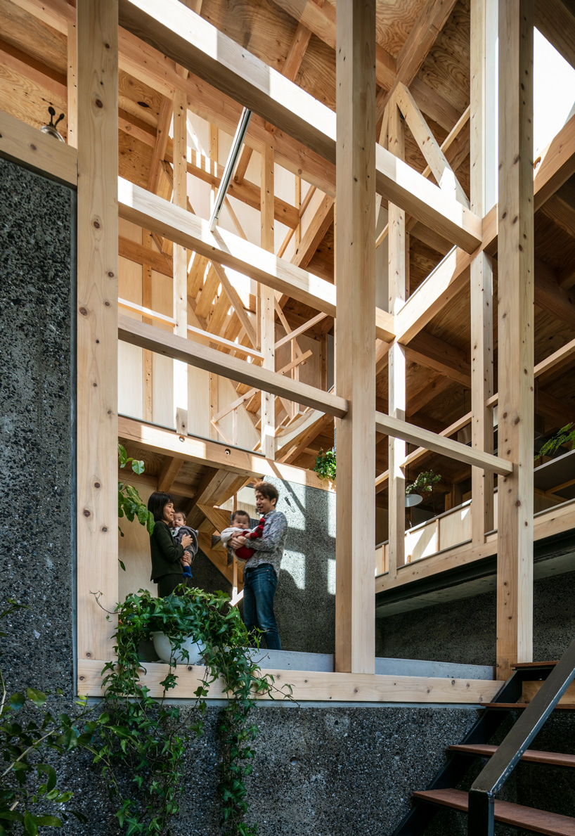 kiyoaki takeda's timber house with five retaining walls in tokyo merges nature with artefact