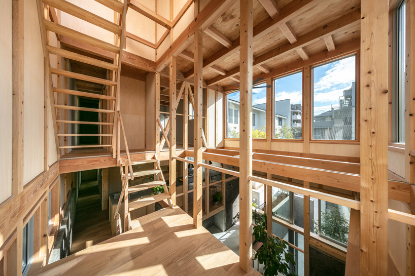 kiyoaki takeda's timber house with five retaining walls in tokyo merges nature with artefact