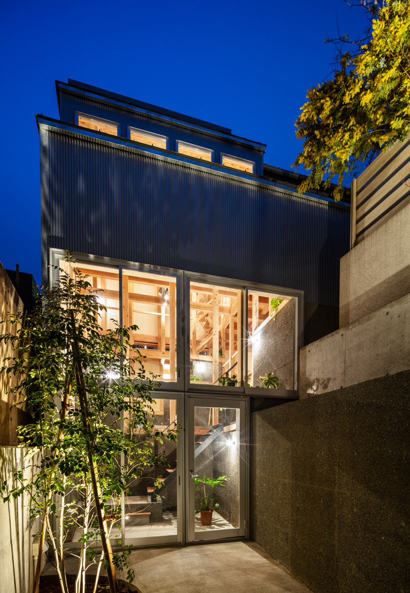 kiyoaki takeda's timber house with five retaining walls in tokyo merges nature with artefact - 5