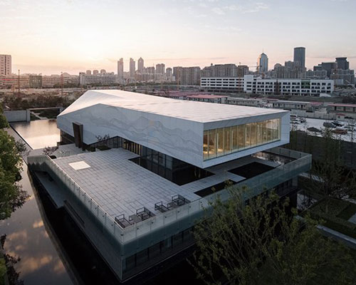 lacime architects uses simple geometry to design an exhibition hall in suzhou, china