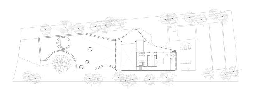 the wedged volume of lagula's 'gruyere house' optimizes both privacy and views in girona designboom