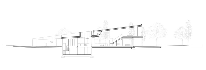 the wedged volume of lagula's 'gruyere house' optimizes both privacy and views in girona designboom