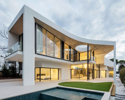 the wedged volume of lagula's 'gruyere house' optimizes both privacy and views in girona
