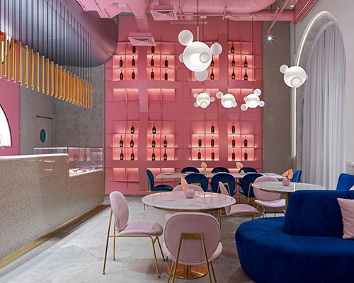 lenz/architects installs curved pink storage rack within 'dijon' restaurant in kazakhstan