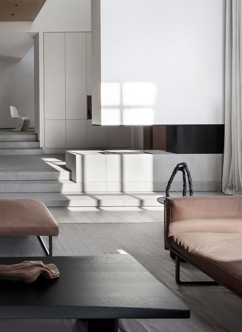 liang architecture inserts a light-filled atrium into apartment renovation in china designboom