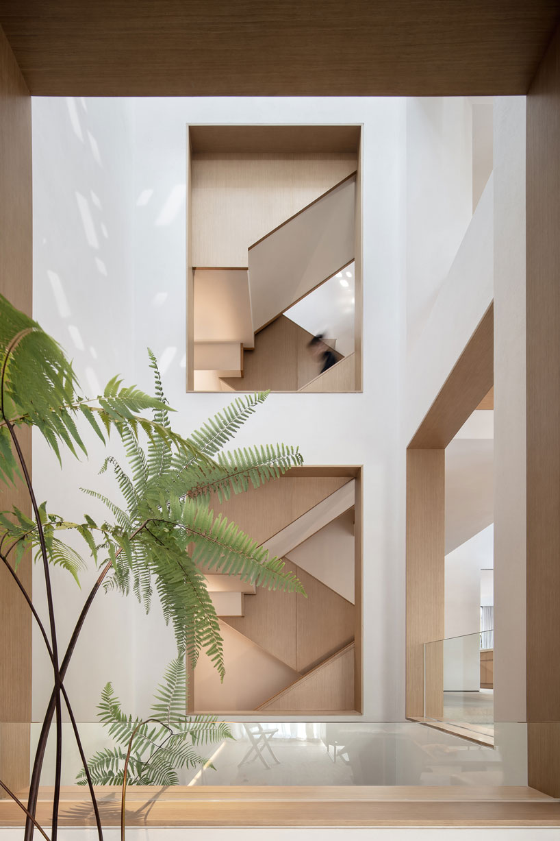 liang architecture inserts a light-filled atrium into apartment renovation in china designboom