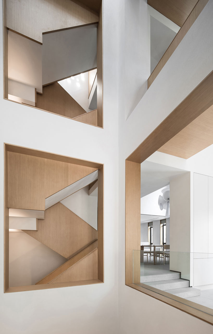 liang architecture inserts a light-filled atrium into apartment renovation in china designboom