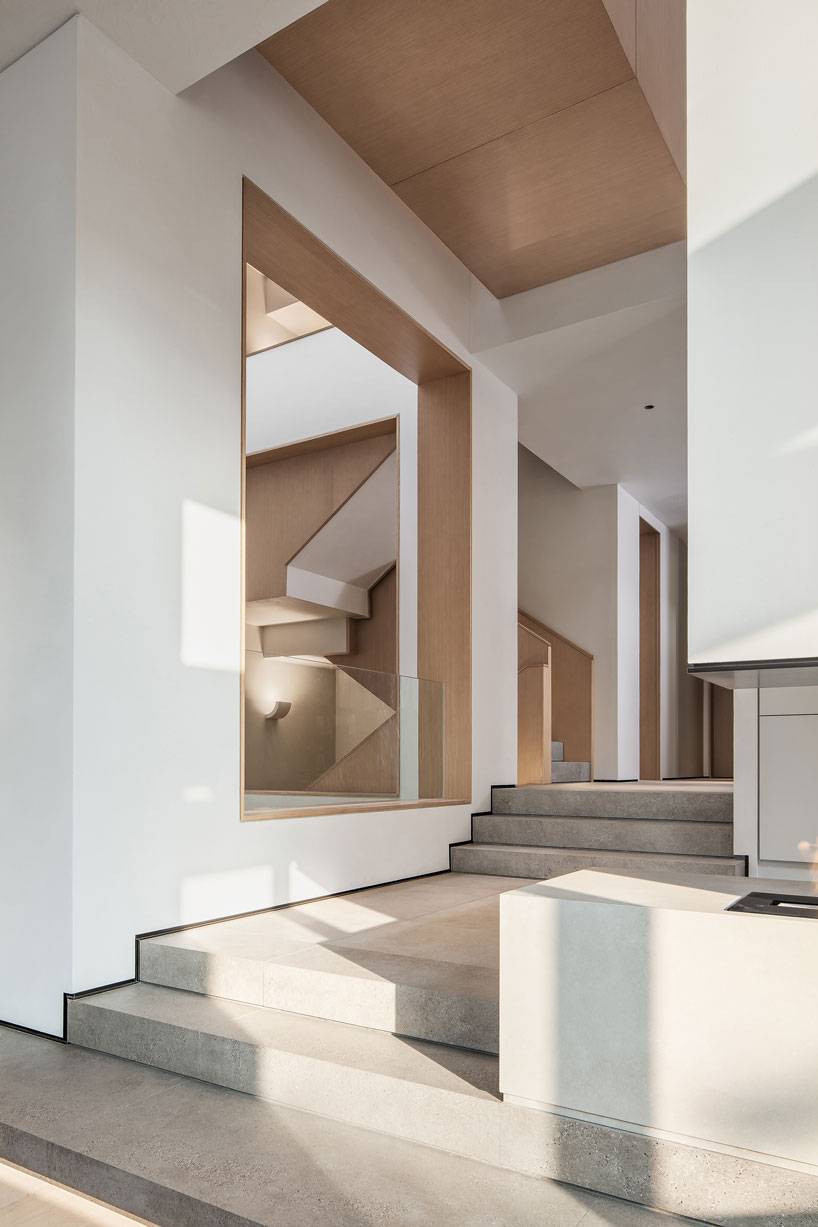 liang architecture inserts a light-filled atrium into apartment renovation in china designboom