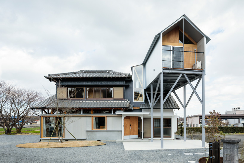 maki yoshimura adds lifted volume to 'house in nishisakabe' renovation in japan