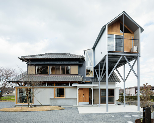 maki yoshimura adds lifted volume to 'house in nishisakabe' renovation in japan