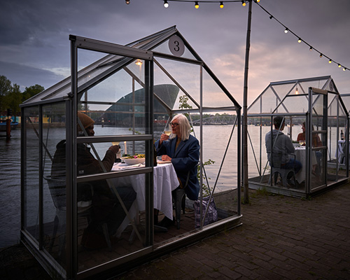 restaurant in amsterdam installs greenhouses to ensure social distancing