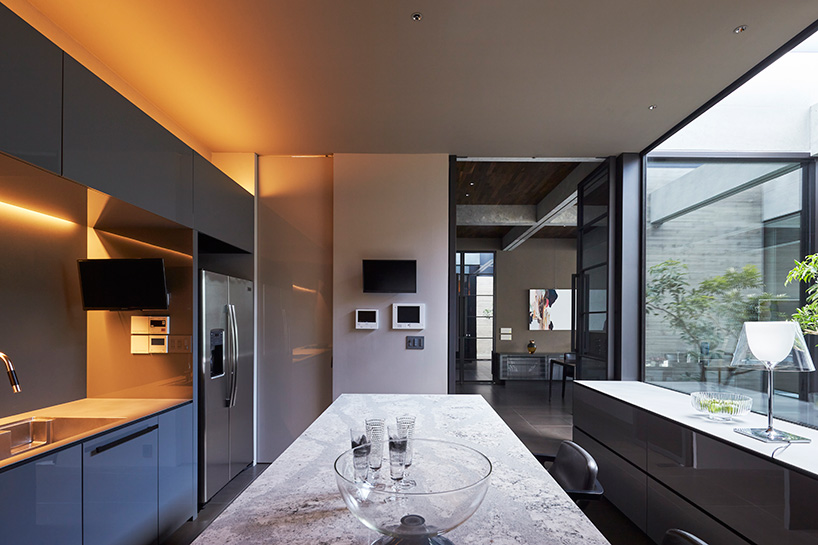 apollo architects builds 'ortho' residence in japan with massive offset concrete volumes