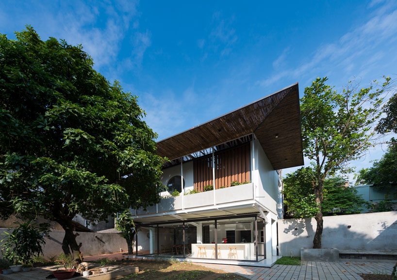 AD+studio builds the 'stacking-roof-house' for a young couple in vietnam designboom