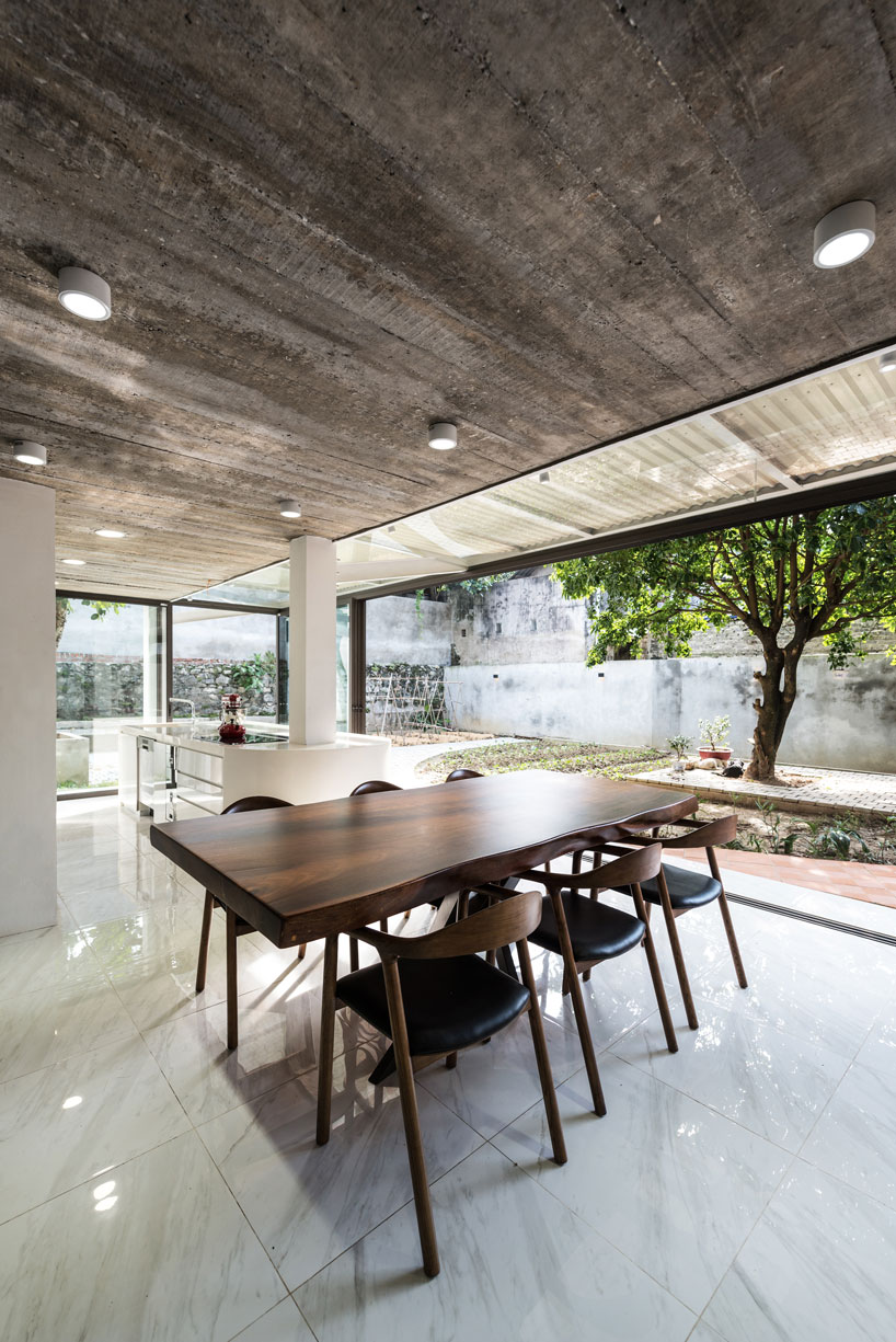 AD+studio builds the 'stacking-roof-house' for a young couple in vietnam designboom