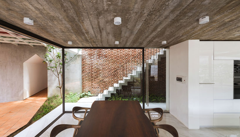 AD+studio builds the 'stacking-roof-house' for a young couple in vietnam designboom