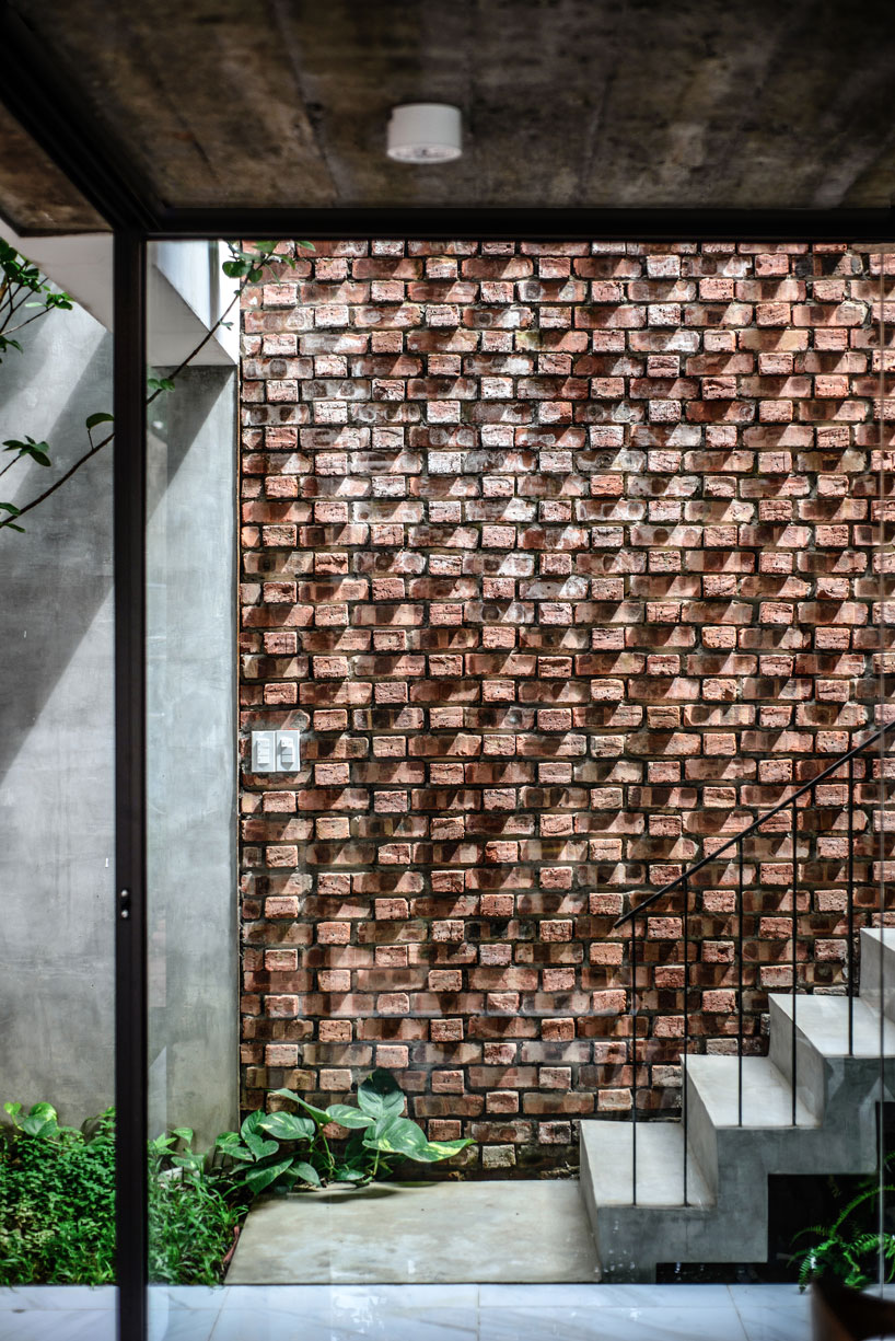 AD+studio builds the 'stacking-roof-house' for a young couple in vietnam designboom